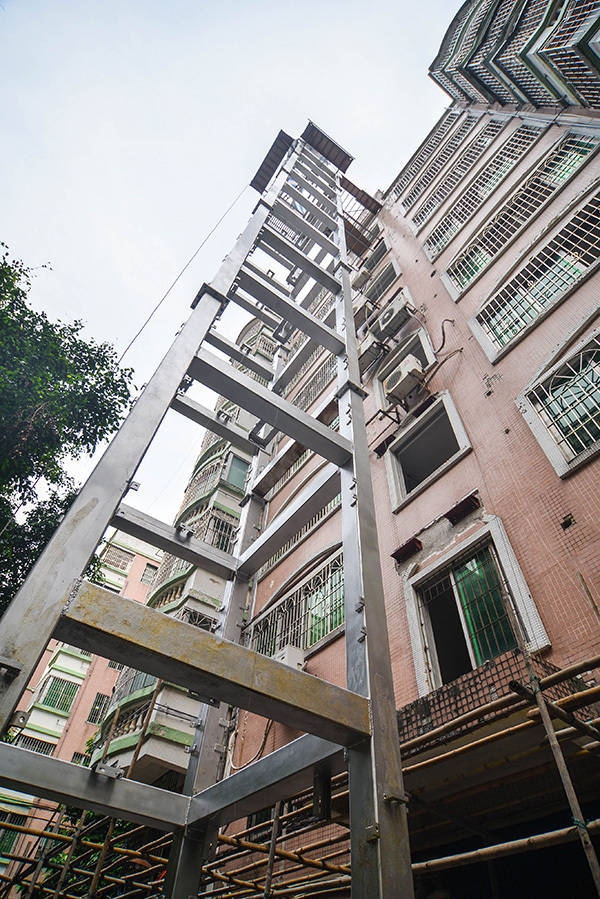 三菱旧楼加装电梯设计 三菱旧梯拆除改造方案
